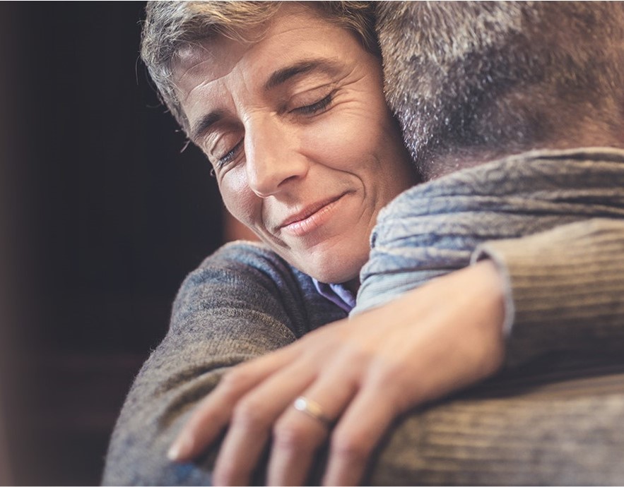 older couple - white - hugging - cropped